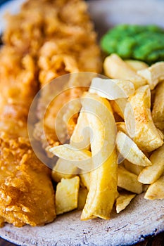 Traditional english food - Fish and chips with mushy peas