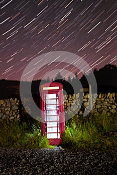 Traditional english phonebox at night