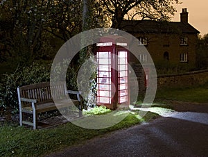 Traditional english phonebox at night