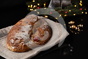 Traditional European Christmas pastry, fragrant home baked stollen, with spices and dried fruit.