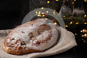 Traditional European Christmas pastry, fragrant home baked stollen, with spices and dried fruit.