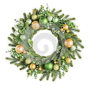 Traditional European Christmas wreath with golden and green baubles