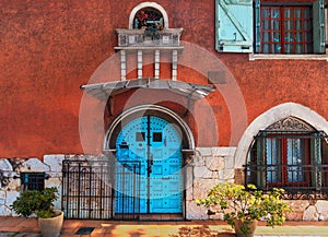 Traditional european facade with entance door photo