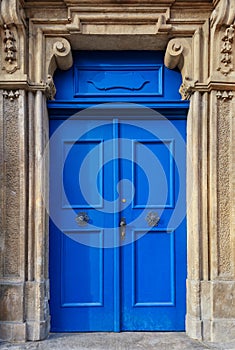 Traditional european facade with entance door photo