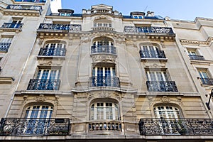 The traditional facade of Parisian building, France.