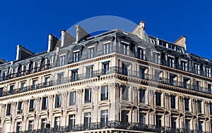 The traditional facade of Parisian building, France.