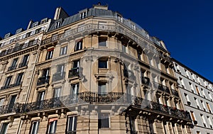 The traditional facade of Parisian building, France.