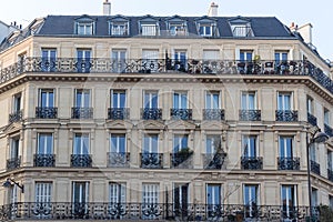 The traditional facade of Parisian building, France.