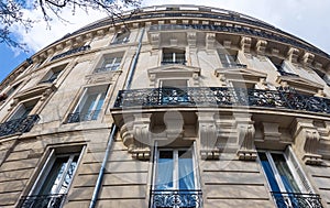 The traditional facade of Parisian building, France.