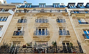 The traditional facade of Parisian building, France.