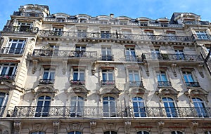 The traditional facade of Parisian building, France.