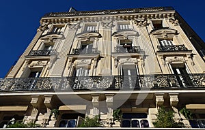 The traditional facade of Parisian building, France.