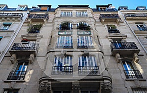 The traditional facade of Parisian building, France.