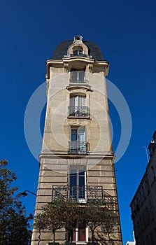 The traditional facade of Parisian building, France.