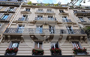 The traditional facade of Parisian building, France.