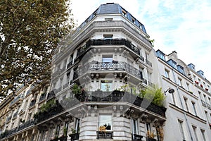 The traditional facade of Parisian building, France.