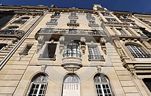 The traditional facade of Parisian building, France.