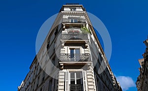 The traditional facade of Parisian building, France.