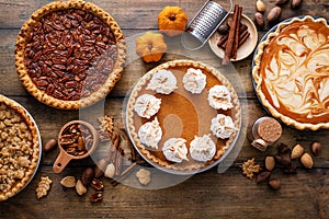 Traditional fall Thanksgiving pies, pumpkin and pecan pie