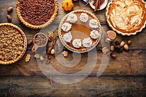 Traditional fall Thanksgiving pies, pumpkin and pecan pie