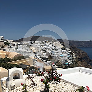 Traditional and famous houses and churches over the Caldera, Aegean sea. panorama. Santorini island, Greece.