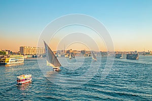 Traditional felucca boats on the Nile River in Aswan