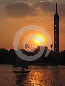 traditional Felucca (sailingboat) at sunset. Cairo