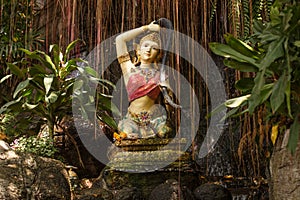 Traditional female goddess in temple Bangkok, Thailand