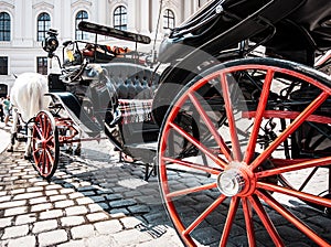 Traditional Fiaker carriage at Hofburg Palace in Vienna, Austria