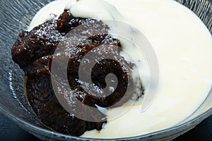 Traditional Finnish cuisine - Typically rye based MÃ¤mmi is eaten around Easter with fresh cream or custard