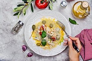 Traditional fish couscous dish with vegetables and seasonings