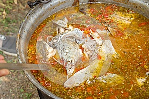 Traditional fish soup Carp soup localy made by villagers in the Danube Delta, Romania