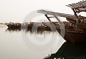 Traditional Fishing boat, dhows parked in the fishing harbor, Bahrain