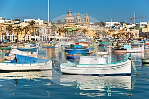 Traditional fishing boats in the Mediterranean Village of Marsaxlokk, Malta