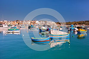 Traditional fishing boats in the Mediterranean Village of Marsaxlokk, Malta