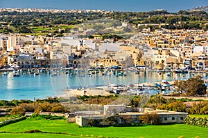 Traditional fishing boats in the Mediterranean Village of Marsaxlokk, Malta