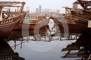 Traditional fishing boats and reflection, Bahrain