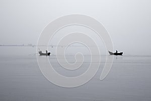 Traditional fishing boats during toil
