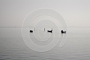 Traditional fishing boats during toil