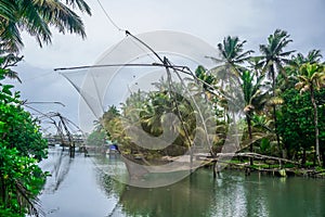Traditional fishing and fishing nets in Keralas tropical river