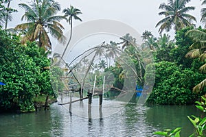 Traditional fishing and fishing nets in Keralas tropical river