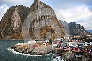 Traditional Fishing Hut Village in Hamnoy Mountain Peak in Lofoten Islands, Norway.  Travel