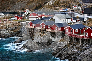 Traditional Fishing Hut Village in Hamnoy Mountain Peak in Lofoten Islands, Norway.  Travel