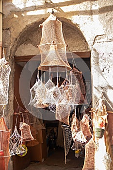 Traditional fishnets hanging in a shop at Cefalu