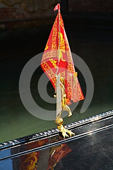 Traditional flag on gondola, Venice, Italy