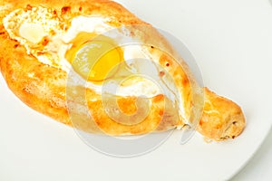 Traditional flatbread khachapuri or hachapuri with egg