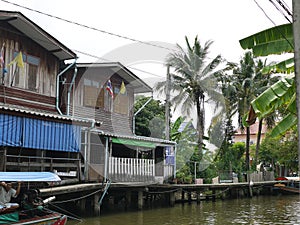 Traditional floating habitats along the canal with very natural rural life in Thailand.