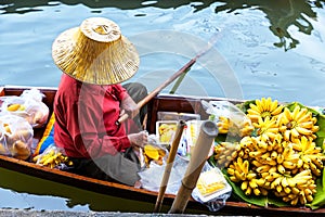 Traditional floating market in Damnoen Saduak