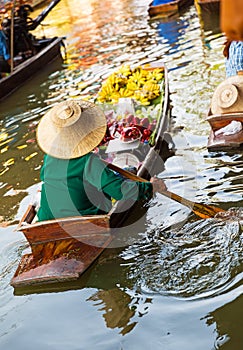 Traditional floating market in Damnoen Saduak