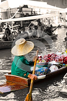 Traditional floating market in Damnoen Saduak near Bangkok. photo